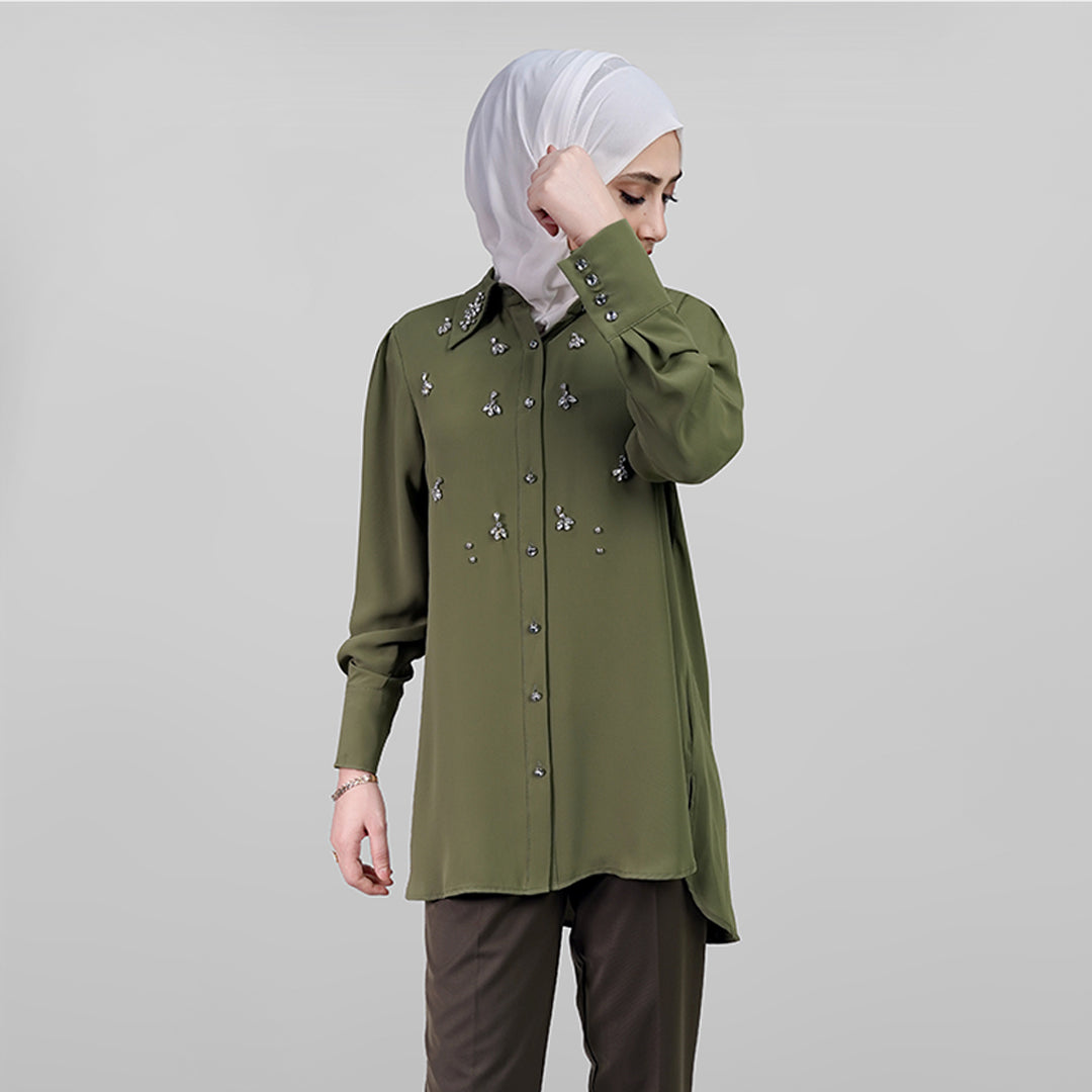Embellished green shirt with long sleeves