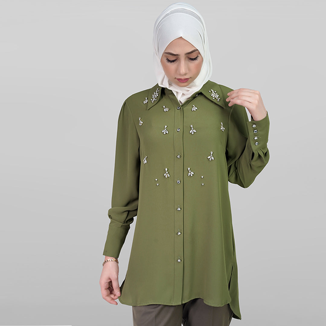 Embellished green shirt with long sleeves