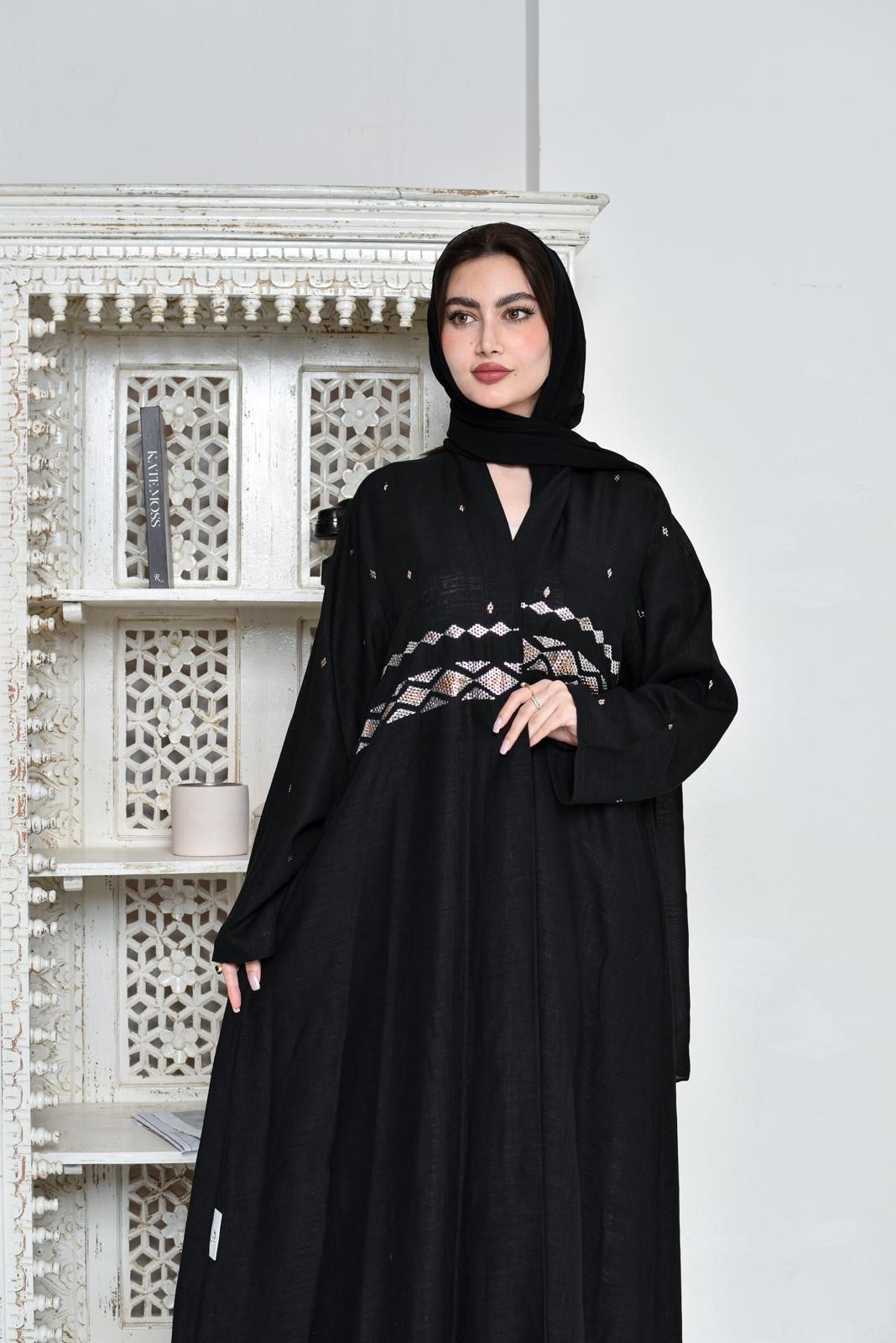 black linen fabric Abaya embroidered with Bahraini Naghda art