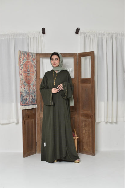 Green linen fabric abaya made of appliqué art with hand embroidery