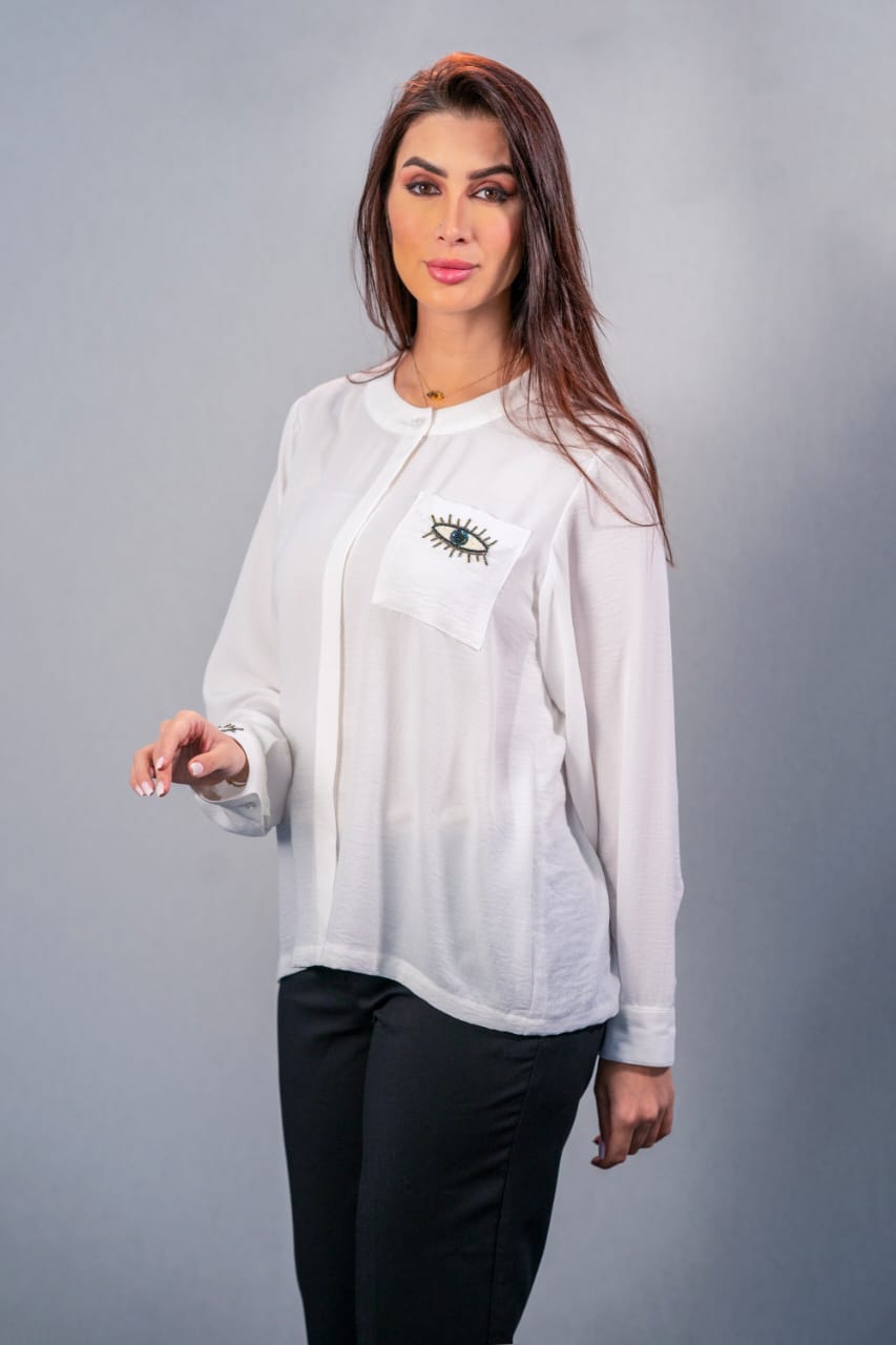Modern free size shirt with front buttons, hand-embroidered (prominent eye)