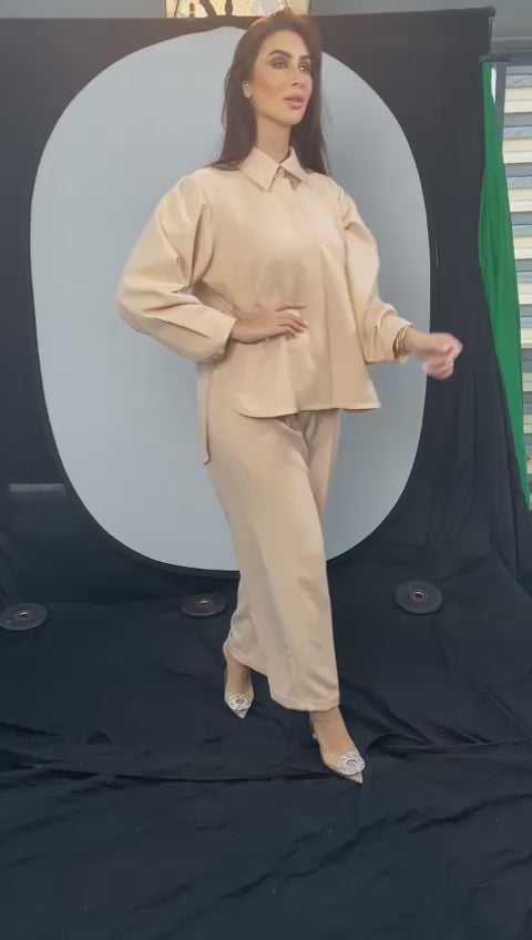 Two-piece beige suit, modern loose shirt with high-waisted pants